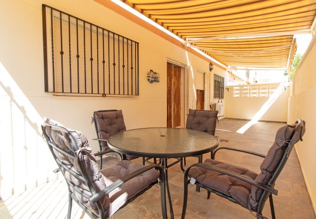 Apartamento en Canet d´en berenguer - Global Properties: Apartamento con terraza en la playa de  Canet d'en Berenguer