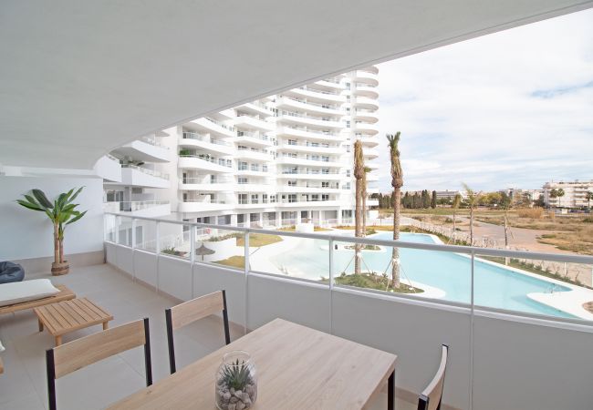  in Canet d´en berenguer - Global Properties: Apartment with terrace and pool views in Gran Canet